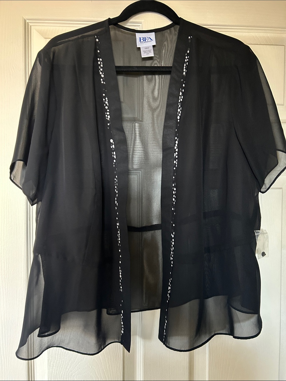 BFA Black Sheer Open-Front Shrug with polka dot Trim.